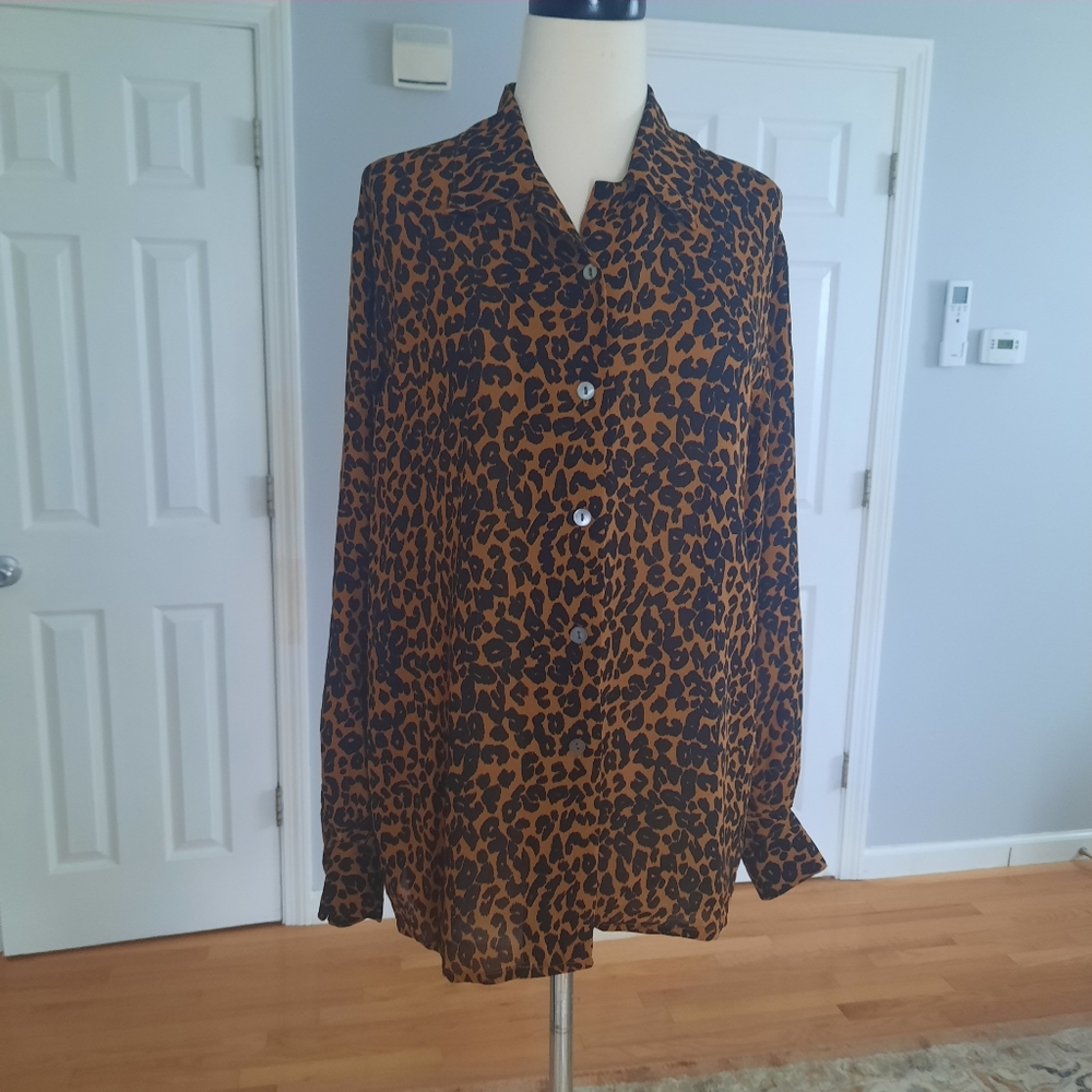 Animal print silk button down long sleeve shirt.